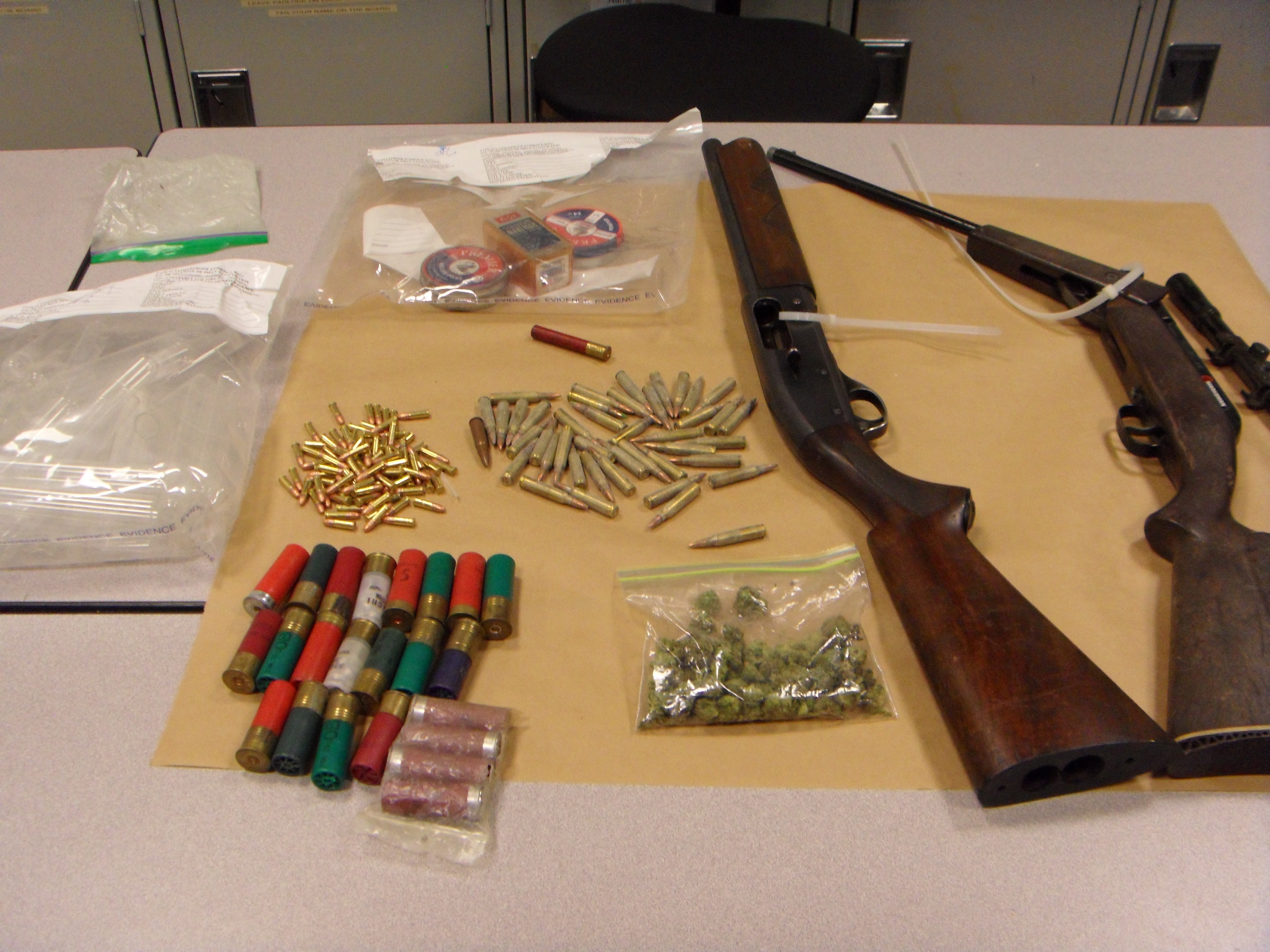 Surrey RCMP Drug Unit seized sawed off shotgun and ammunition.