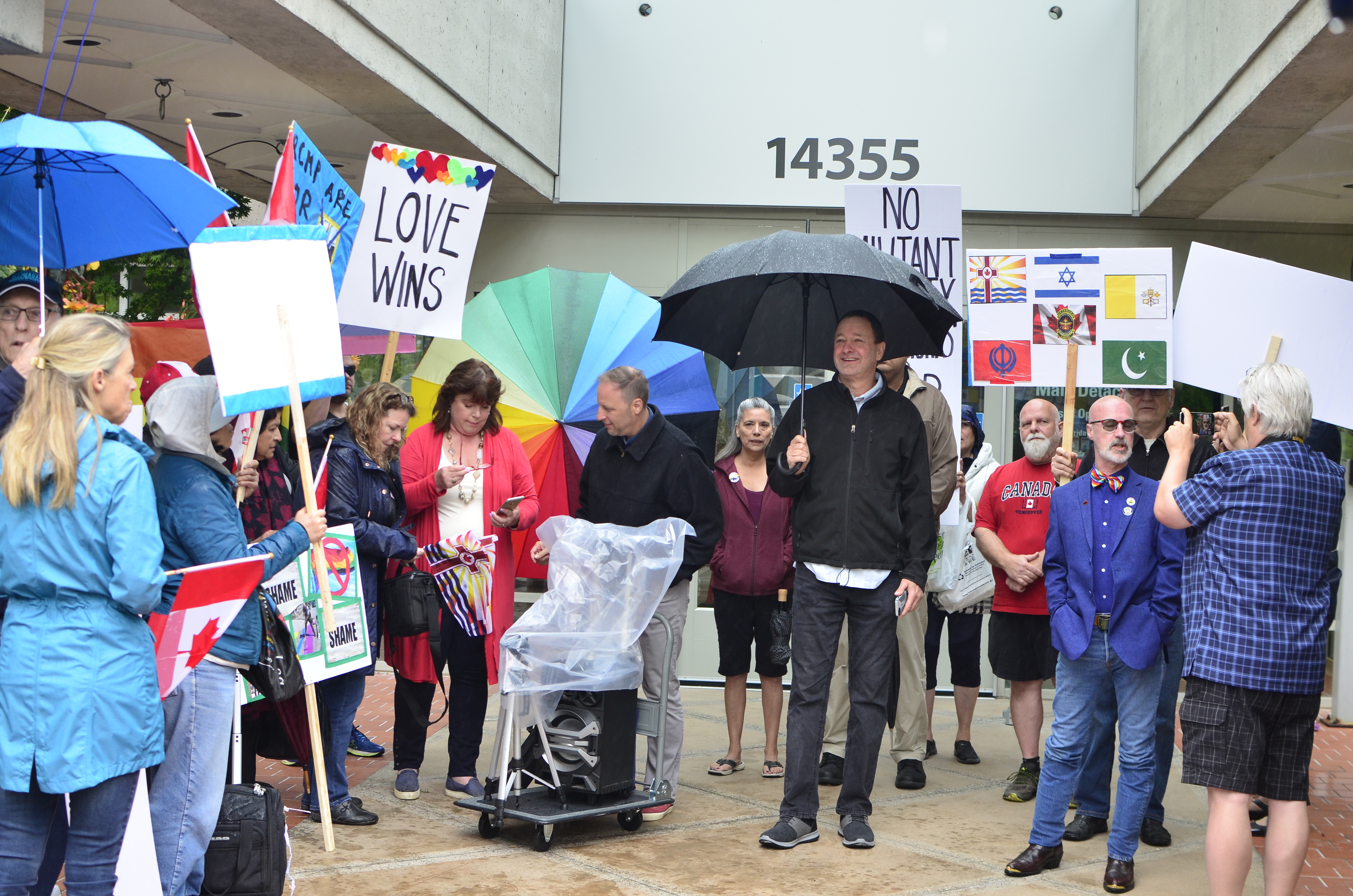 Groups clash at RCMP gay pride flag raising